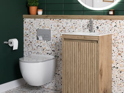 Small bathroom design Essex Northamptonshire featuring space-saving fixtures and clever storage solutions - Bowman Bathrooms
