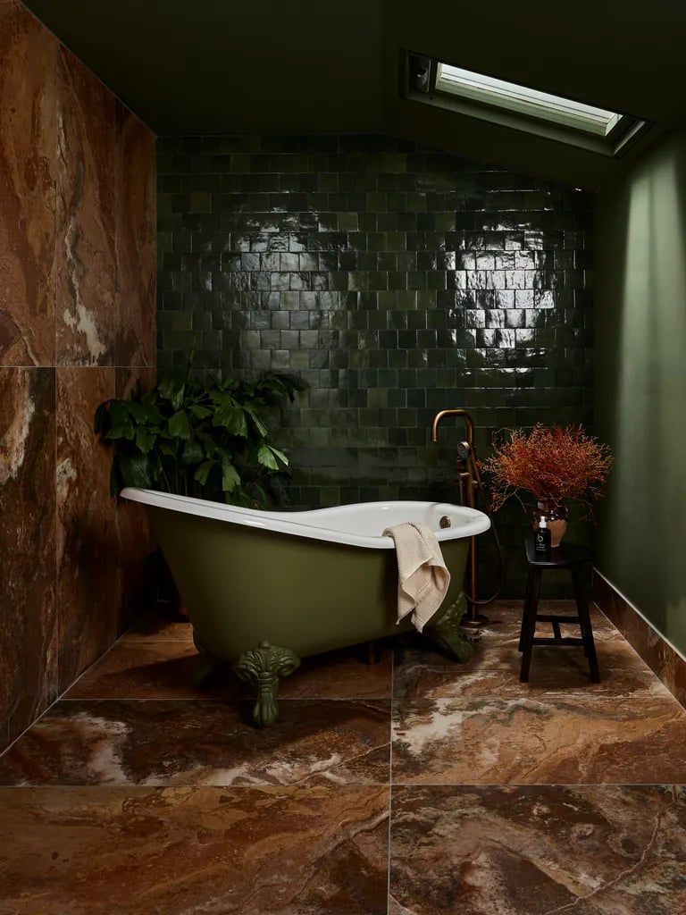 Refined contemporary bathroom with freestanding tub and designer fixtures in Essex