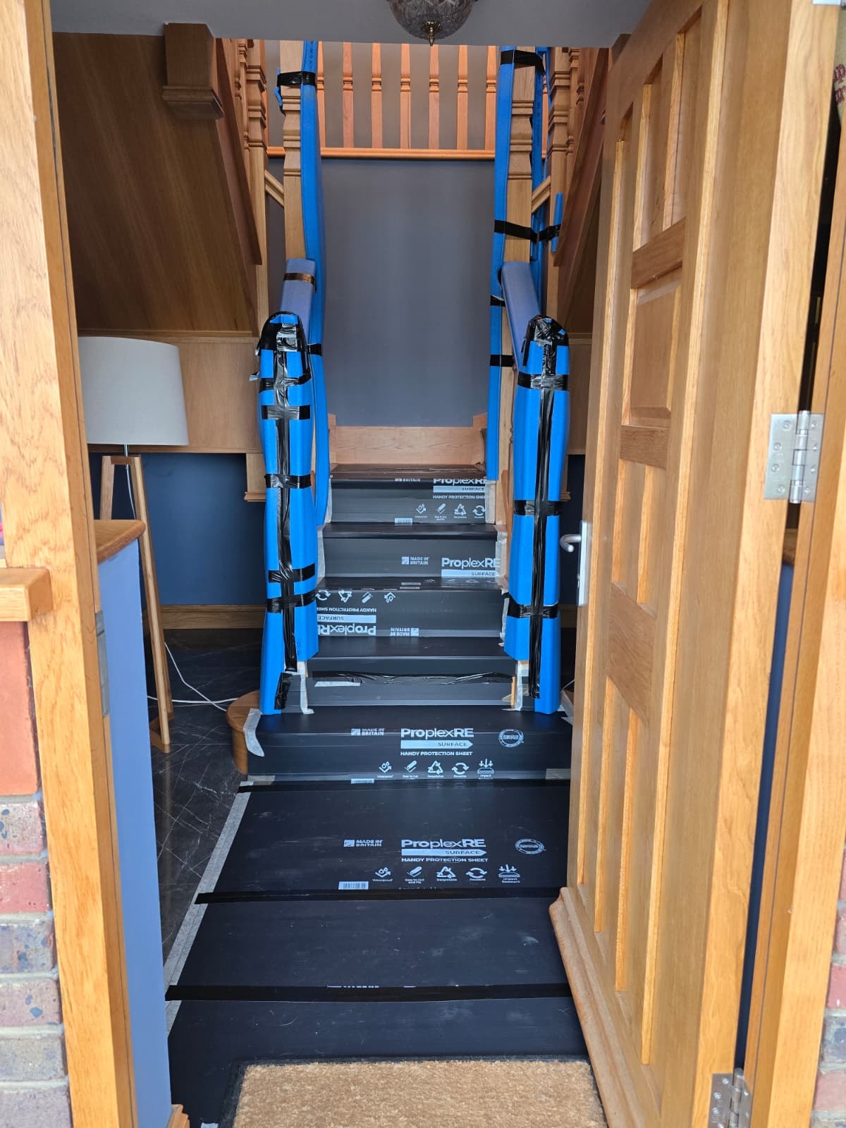 Professional bathroom installer protecting home during installation in Northamptonshire - Bowmans NN11