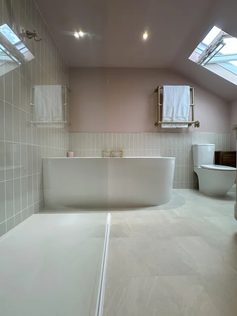 Final handover of completed luxury bathroom installation with comprehensive warranty