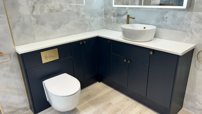 Be Modern Atlanta navy blue furniture with white worktop and countertop basin Brentwood CM13