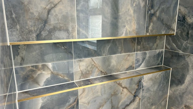 Infinity niche recessed alcove with brushed brass trims in wetroom shower Brentwood CM13