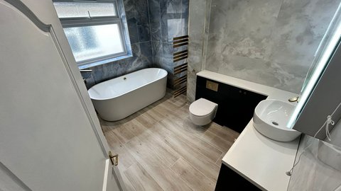 Completed luxury bathroom Brentwood CM13 Be Modern Atlanta furniture Ca' Pietra tiles Elisa smart shower Bowmans